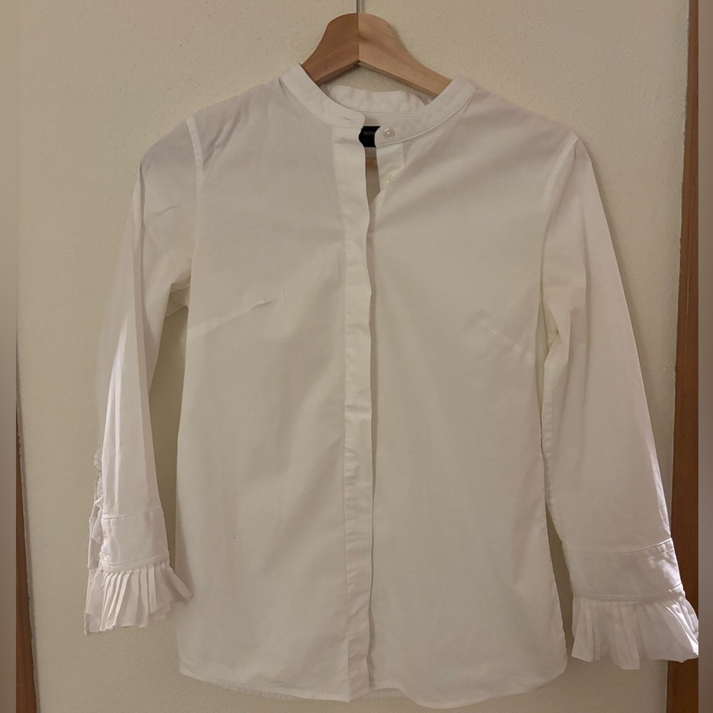 Banana Republic white button-down. Unique ruffled sleeve detail & high collar.